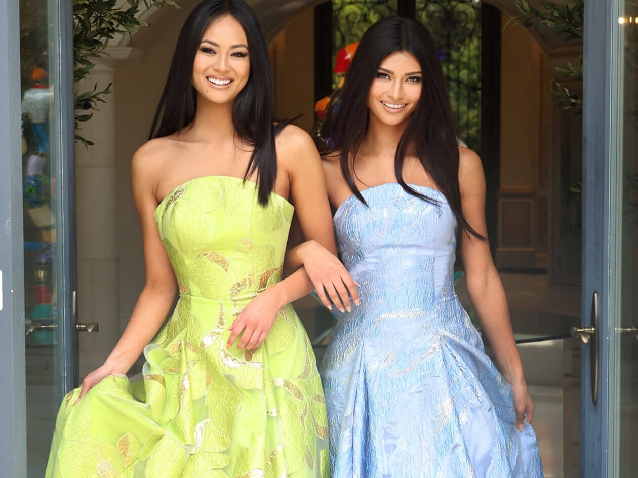 Model wearing a color dresses